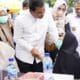 Bupati Maesyal Rasyid membuka CKG di Pagedangan. Sebanyak 400 warga mengikuti pemeriksaan gratis, termasuk layanan rontgen.